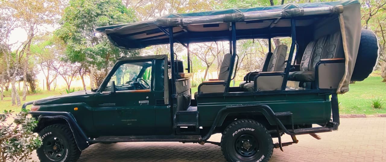 Open-side Land Cruiser ready for safari adventure